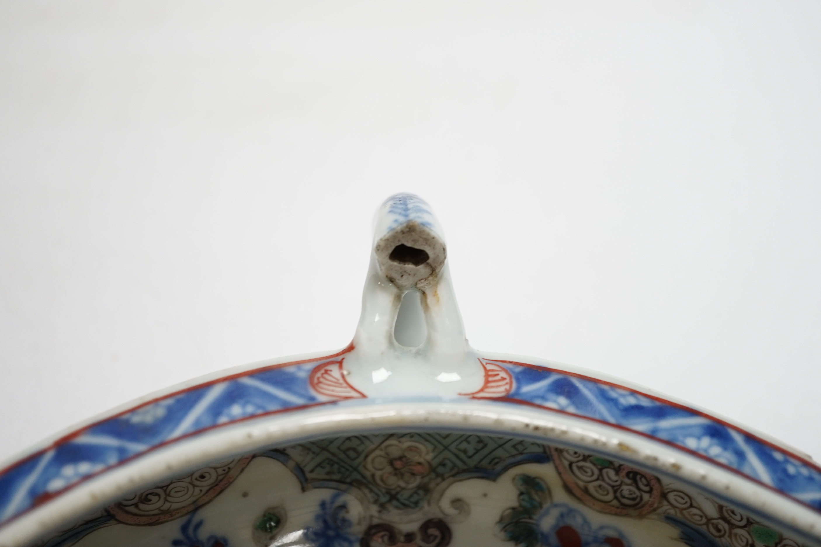 A Chinese clobbered blue and white double lipped sauceboat, Qianlong period, 23cm high